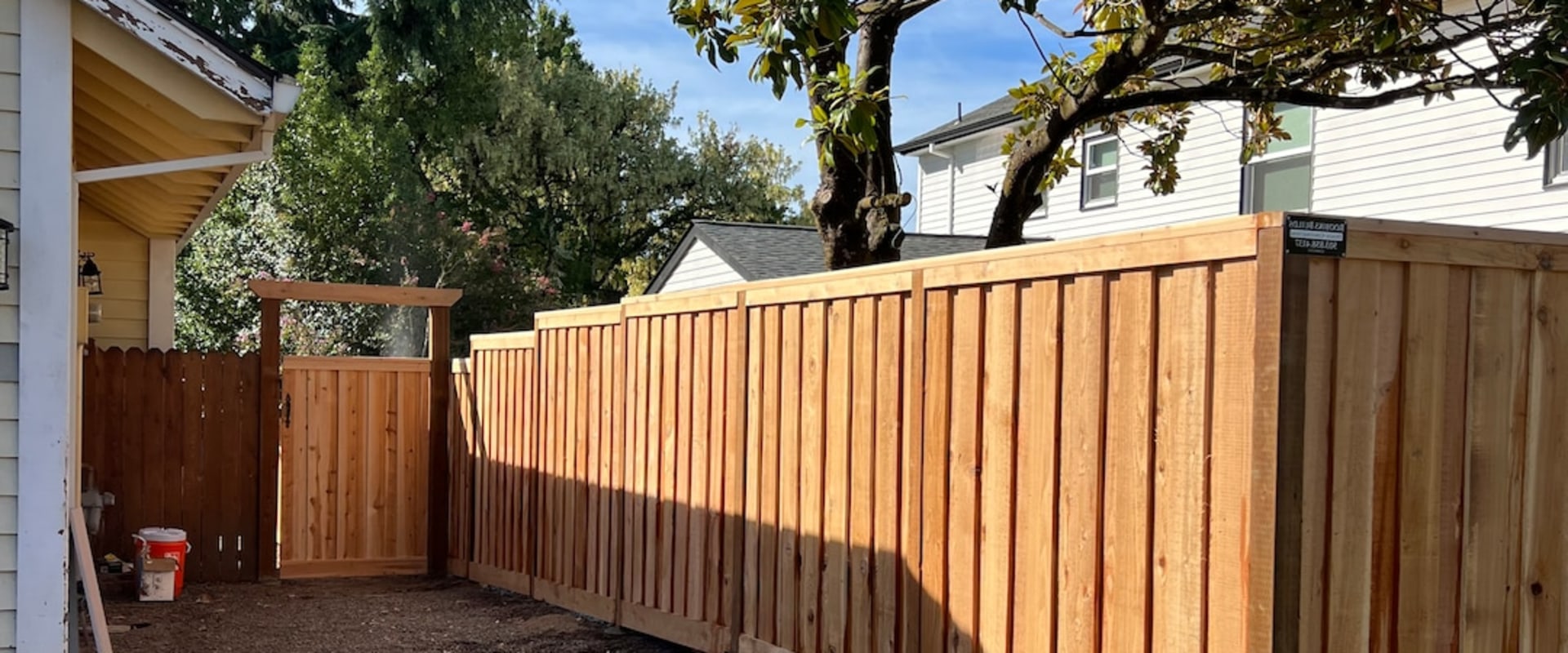 How Do Fence Contractors And Landscaping Services Collaborate To Transform Tigard, OR Yards